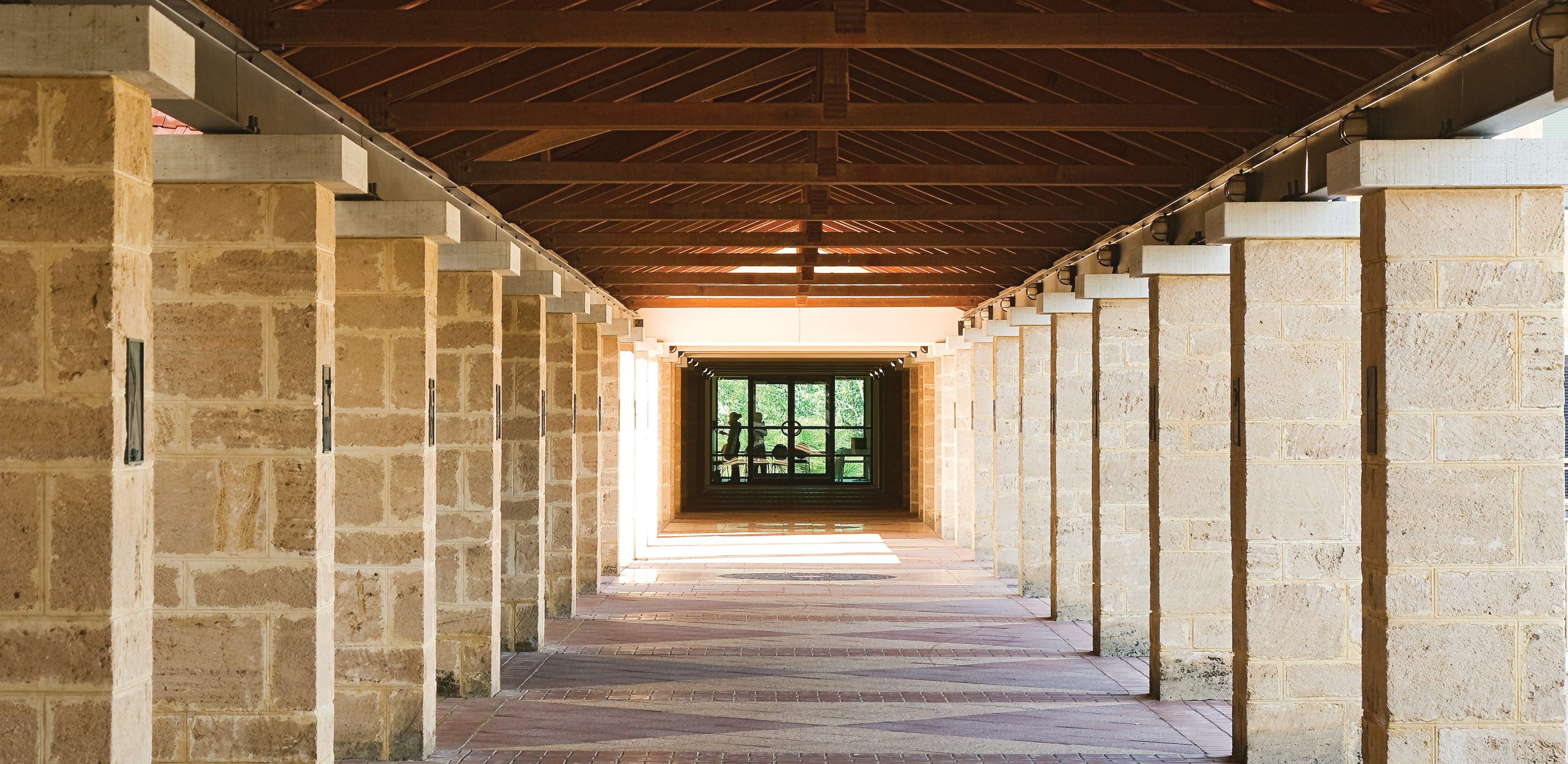 Stone walkway with repeating stone columns