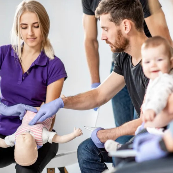 Small group of adults with a baby