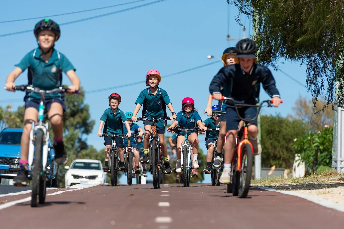 kids riding bikes to school