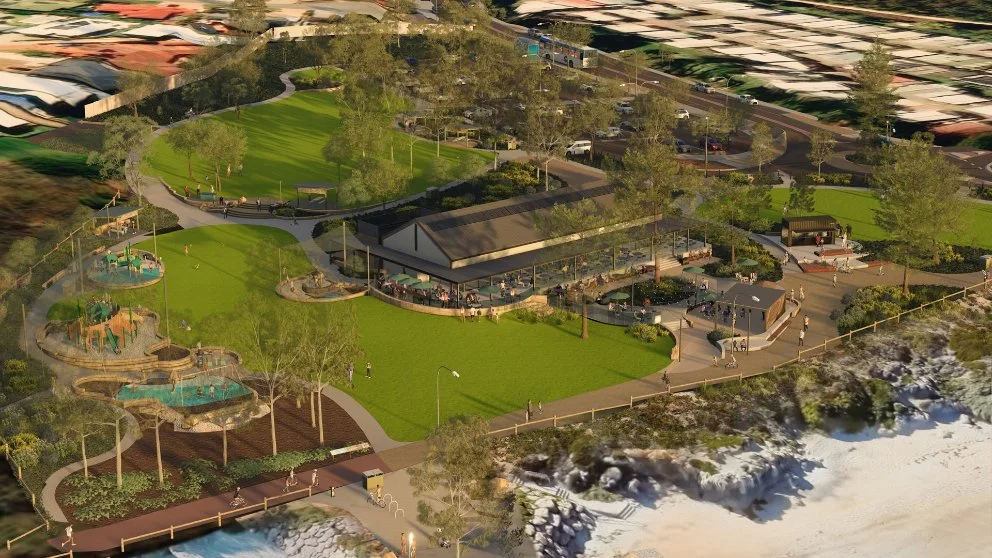 Aerial view looking east over the park, café, lawns, paths and surrounding coastal neighbourhood.