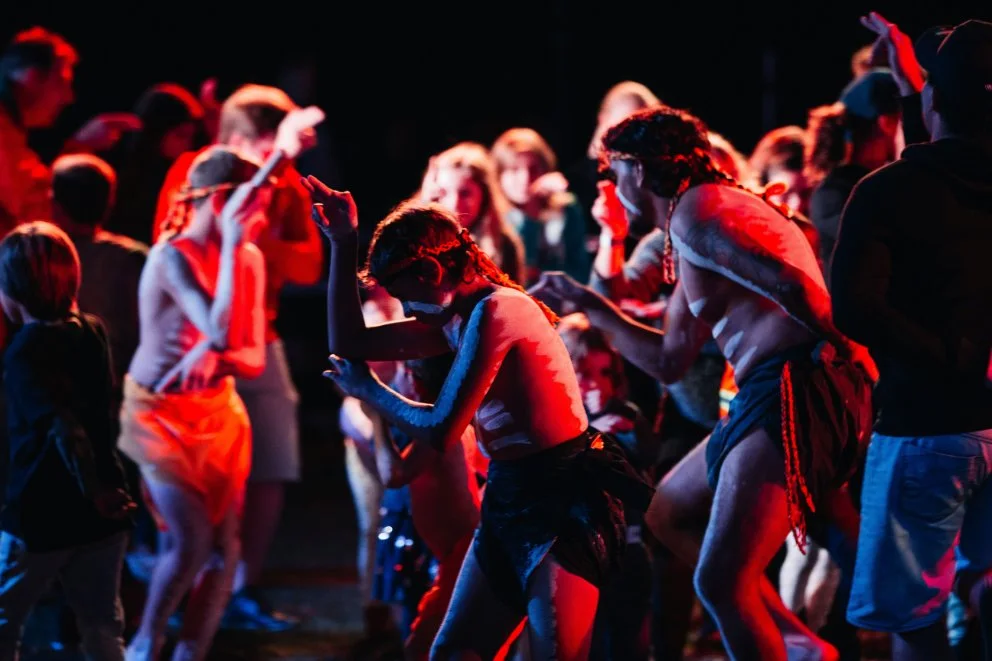 Group of indigenous dancers performing