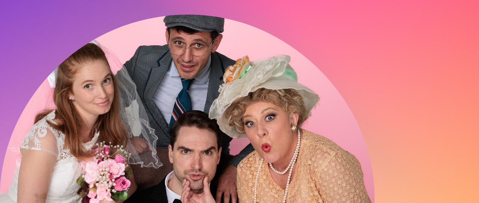 Wedding photo of the bride and groom with two guests.