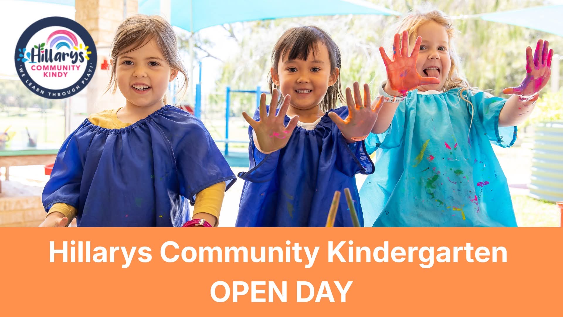 Three kindy children with paint on their hands