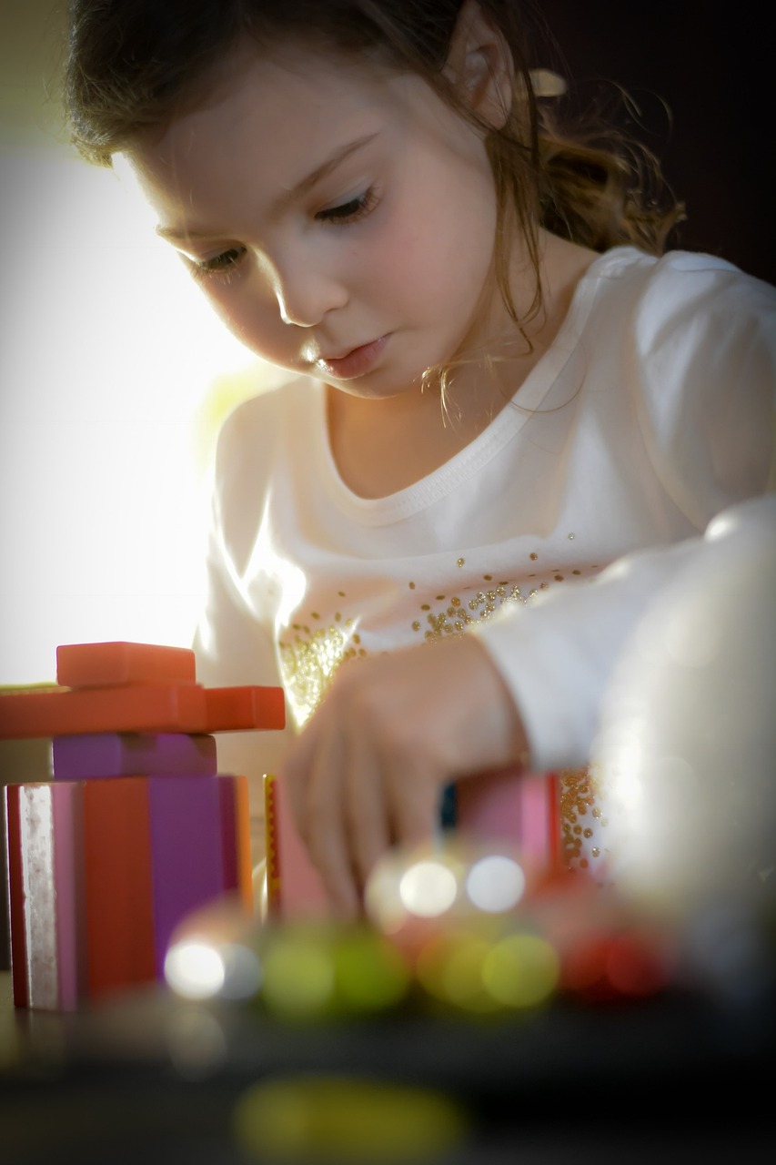 Young child playing with toys
