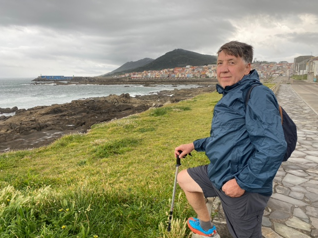 Man in scenic location overlooking ocean