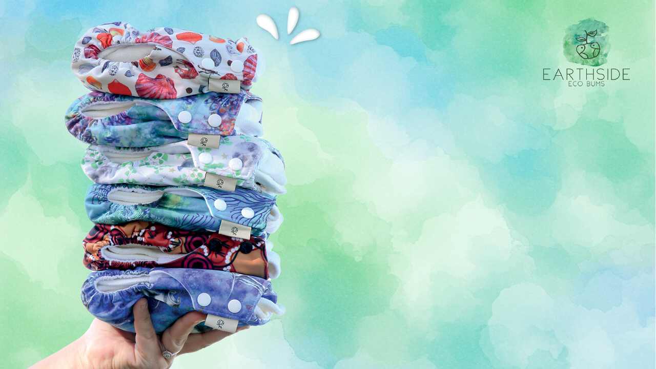 A baby wearing cloth nappies