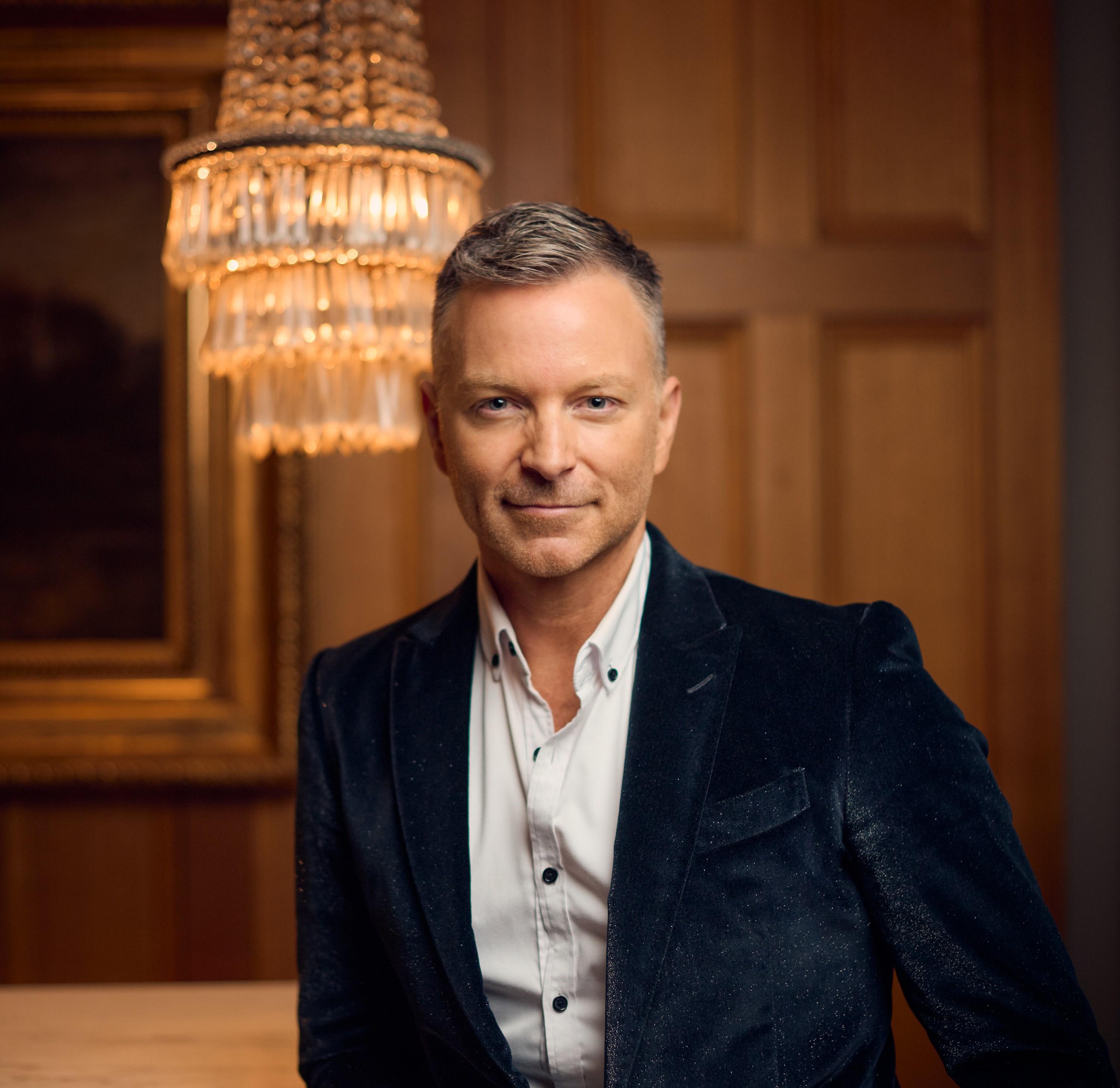 Image of artist Tim Campbell smiling and looking ahead.