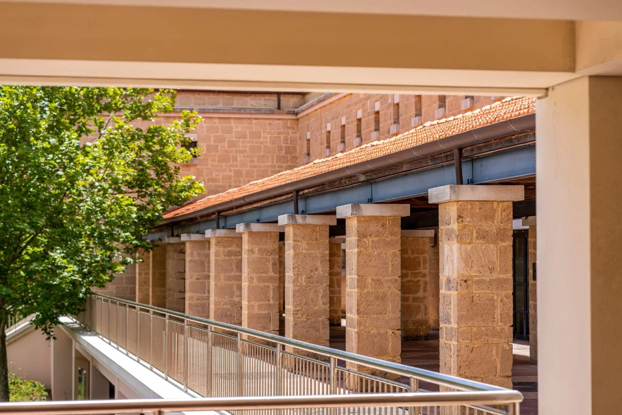 A through the camera lens style photo showing City of Joondalup Civic Centre pathway 