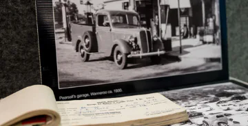 History photo with old car and books