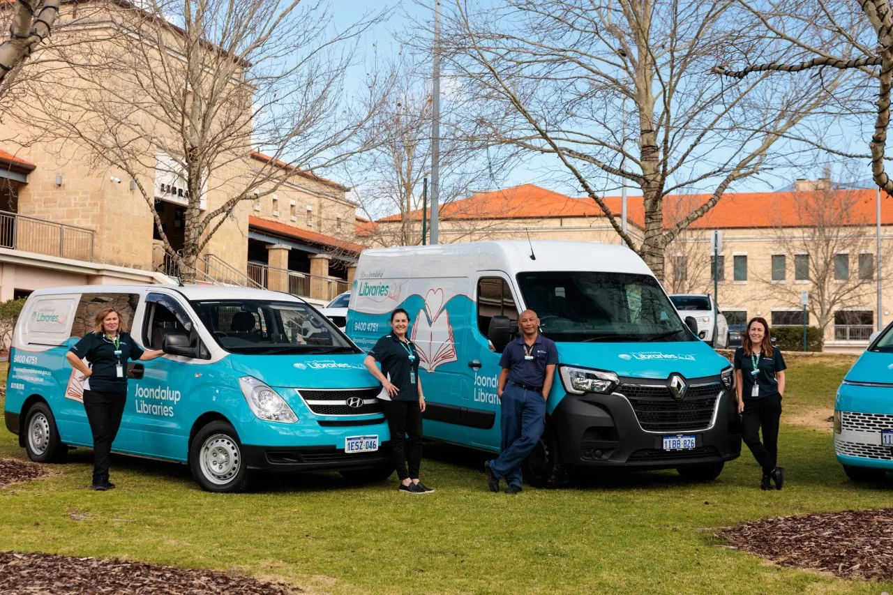Library staff in front of Books on Wheels van at Joondalup Library