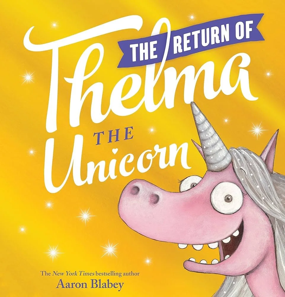 Cover of Thelma the Unicorn book - bright yellow background with white unicorm