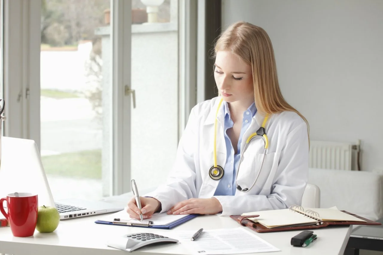 Doctor sitting at her desk