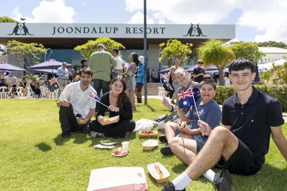 Relaxing on the lawns of Joondalup Resort after the citizenship ceremony