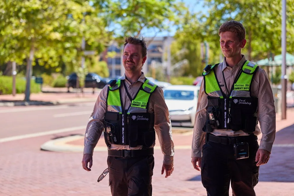 safety officer walking city street